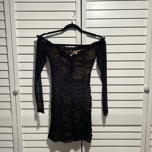 Black mini dress wore once in good condition.